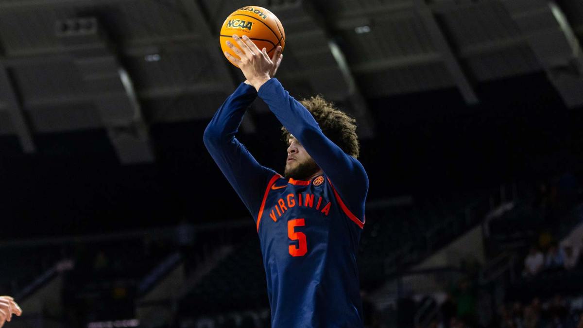 Virginia Cavaliers guard Sam Lewis (5) shoots against the Notre Dame Fighting Irish during the second half at Purcell Pavilion at the Joyce Center.