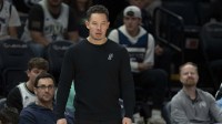 San Antonio Spurs head coach Mitch Johnson looks on against the Minnesota Timberwolves in the second half at Target Center.