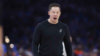 San Antonio Spurs head coach Mitch Johnson screams during a time out against the Oklahoma City Thunder during the second half at Paycom Center.