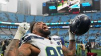Seattle Seahawks defensive end Leonard Williams (99) reacts on the field after the game against the Carolina Panthers at Bank of America Stadium.