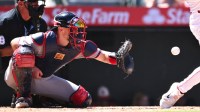 Atlanta Braves catcher Sean Murphy (12) makes a catch against the Los Angeles Angels during the sixth inning at Angel Stadium.