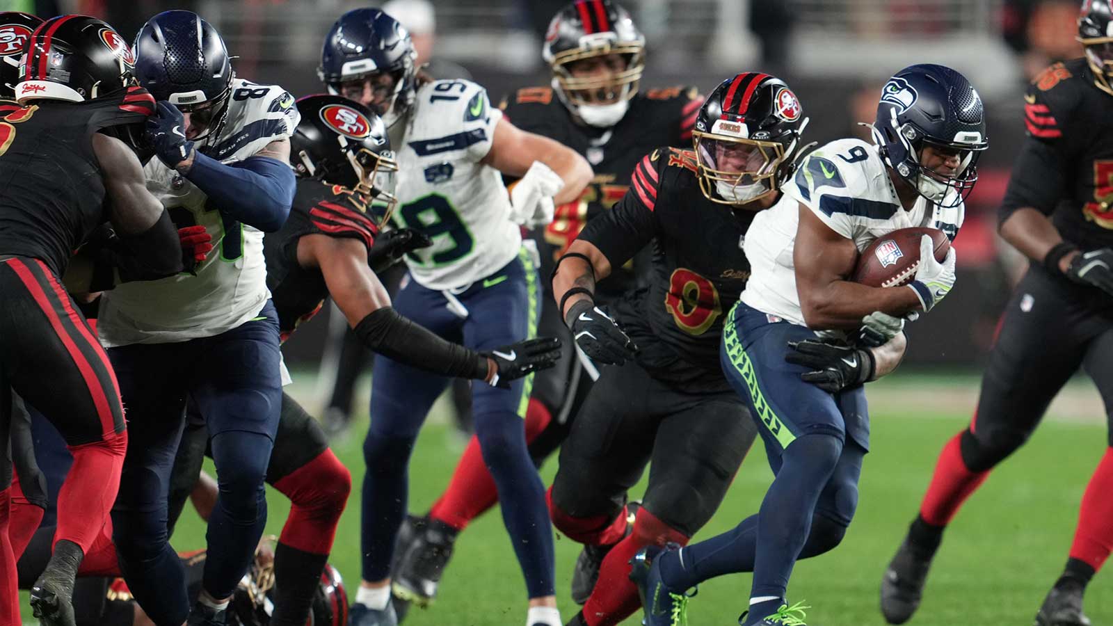 Seattle Seahawks running back Kenneth Walker III (9) rushes the ball against the San Francisco 49ers during the second half at Levi's Stadium.
