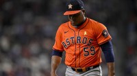 Sep 7, 2025; Arlington, Texas, USA; Houston Astros starting pitcher Framber Valdez (59) looks down as he walks off the field during the game between the Texas Rangers and the Houston Astros at Globe Life Field. Mandatory Credit: Jerome Miron-Imagn Images