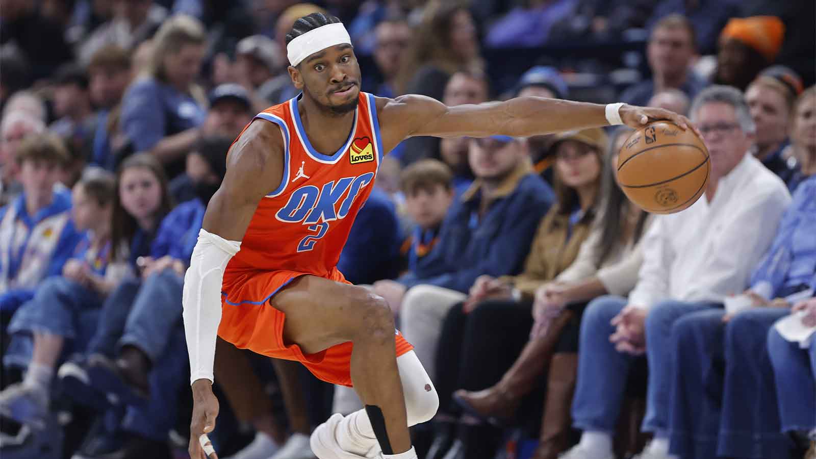 Oklahoma City Thunder guard Shai Gilgeous-Alexander (2) reaches for a loose ball during the second half against the Toronto Raptors at Paycom Center.