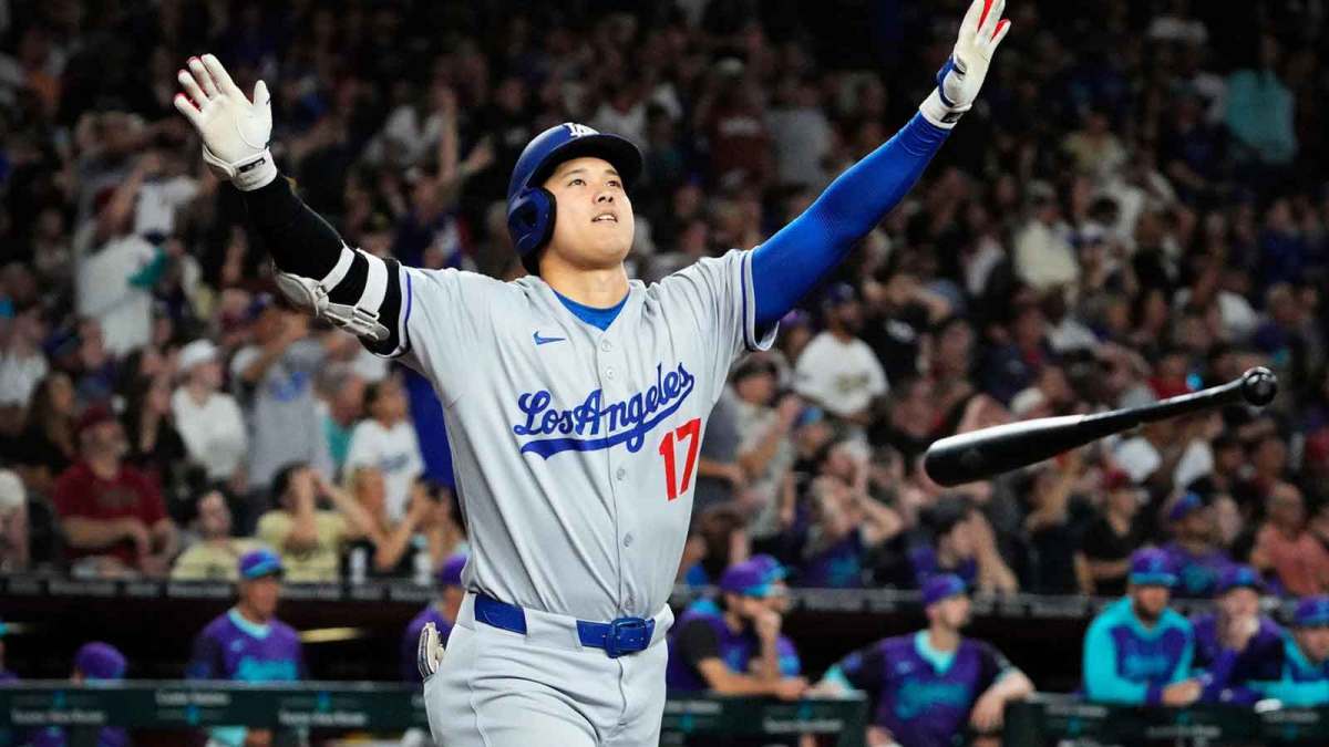 Los Angeles Dodgers Shohei Ohtani tosses his bat after hitting a three run home run against the Arizona Diamondbacks in the ninth inning at Chase Field in Phoenix on May 9, 2025.