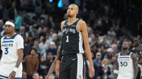 San Antonio Spurs forward Victor Wembanyama (1) walks up the court in the second half against the Minnesota Timberwolves at Frost Bank Center.