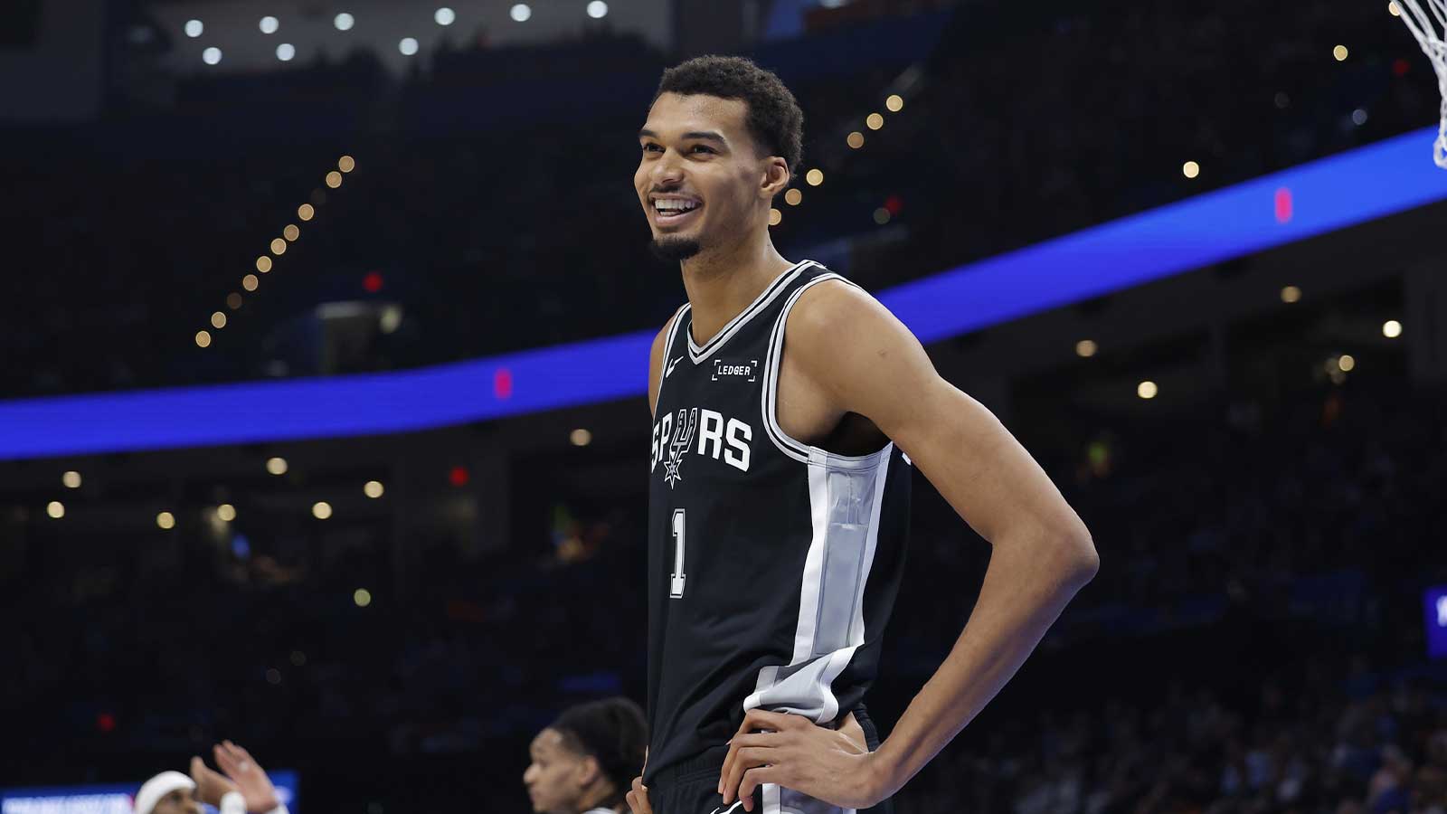 Spurs forward Victor Wembanyama (1) smiles after a play against the Oklahoma City Thunder during the second half at Paycom Center