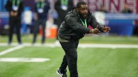 Pittsburgh Steelers linebackers coach Denzel Martin watches in drills during the NFL Combine at Lucas Oil Stadium.