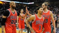 Chicago Bulls forward Taj Gibson (22) and guard Derrick Rose (1) and center Joakim Noah (13) walks off the court after the Milwaukee Bucks beat the Bulls 92-90 in game four of the first round of the NBA Playoffs at BMO Harris Bradley Center.