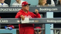 Cincinnati Reds manager Terry Francona looks on from the dugout in the seventh inning of the MLB National League Wild Card Game 1 between the Los Angeles Dodgers and the Cincinnati Reds at Dodger Stadium