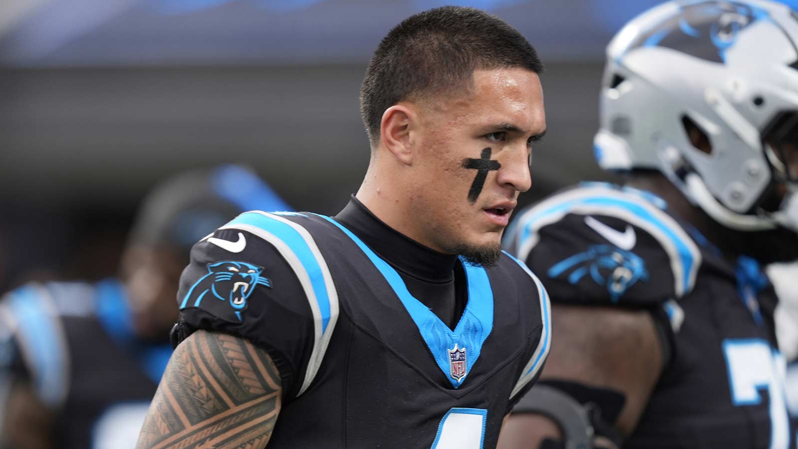 Carolina Panthers wide receiver Tetairoa McMillan (4) reacts in the first half during the NFC Wild Card Round game at Bank of America Stadium.