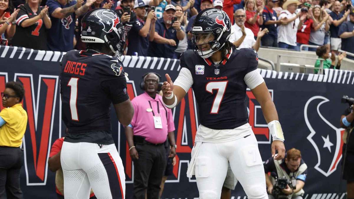 Houston Texans quarterback C.J. Stroud (7) celebrates with wide receiver Stefon Diggs (1) following a first quarter touchdown against the Jacksonville Jaguars at NRG Stadium.