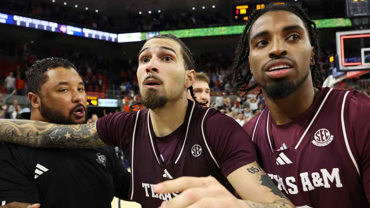 Texas A&M Aggies guard Pop Isaacs (2) and guard Marcus Hill (0) celebrate after officials waived off a last second shot that would have given the Auburn Tigers the win at Neville Arena.