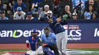 Seattle Mariners third baseman Eugenio Suarez (28) hits a single against the Toronto Blue Jays in the second inning during game seven of the ALCS round for the 2025 MLB playoffs at Rogers Centre.