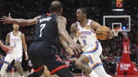 Thunder guard Jalen Williams (8) dribbles the ball as Houston Rockets forward Kevin Durant (7) defends during the third quarter at Toyota Center