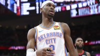 Thunder guard Shai Gilgeous-Alexander (2) reacts after a play during the third quarter against the Houston Rockets at Toyota Center