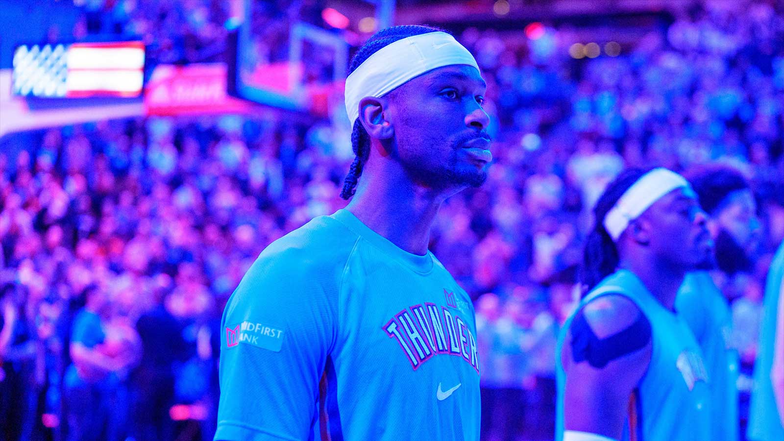 Thunder guard Shai Gilgeous-Alexander (2) stands during the national anthem before the game against the Minnesota Timberwolves at Target Center