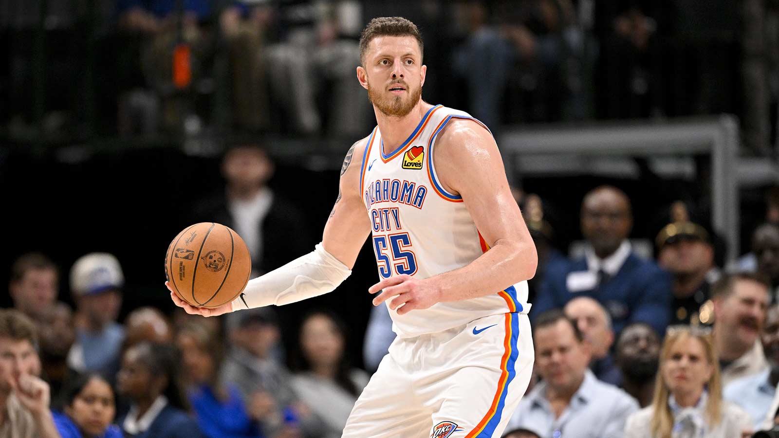 Thunder center Isaiah Hartenstein (55) looks to pass the ball during the game between the Mavericks and the Thunder at the American Airlines Center