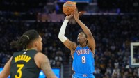 Thunder guard Jalen Williams (8) shoots against Golden State Warriors guard Will Richard (3) during the third quarter at Chase Center with Mark Daigneault in the background