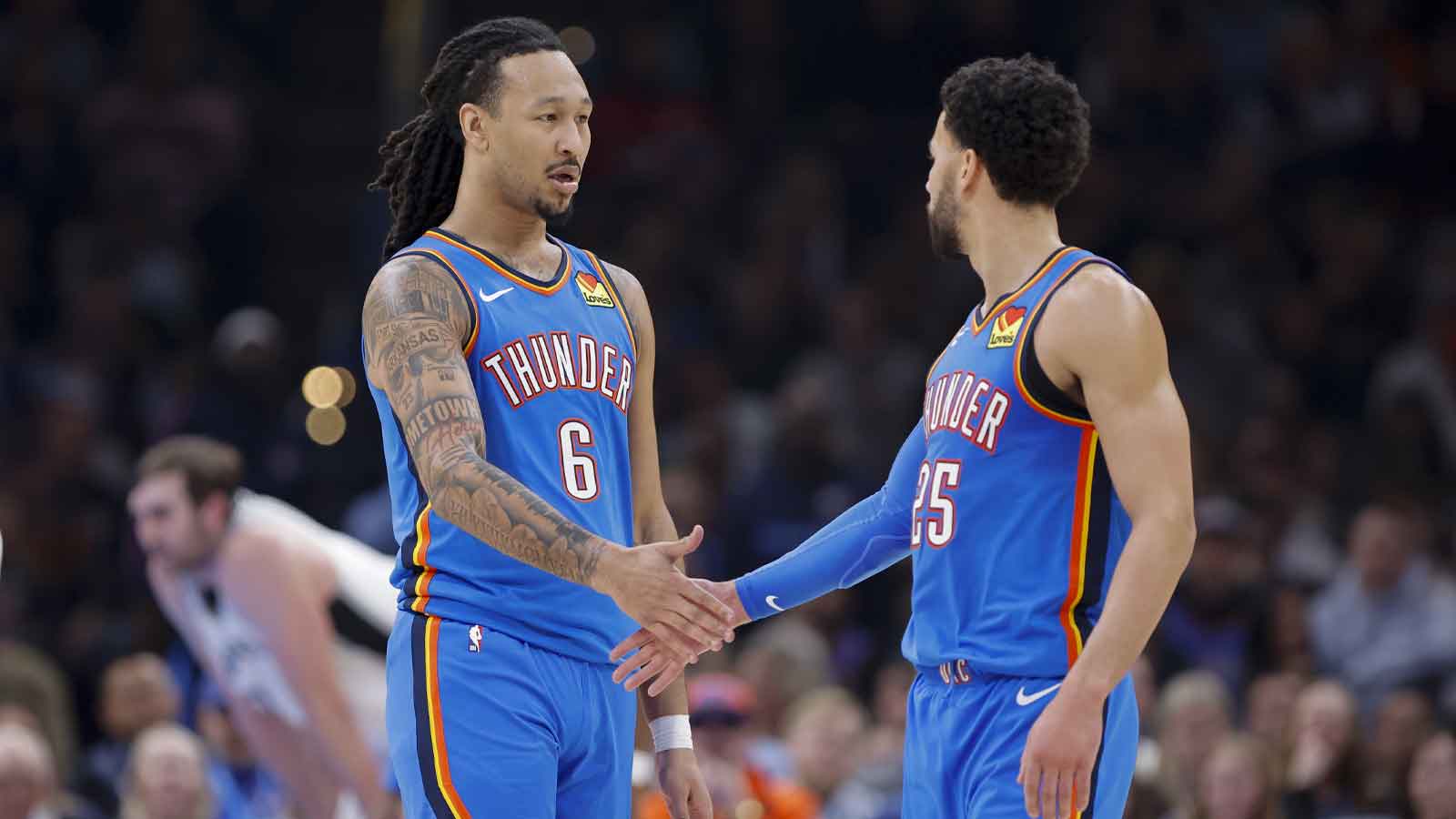Thunder forward Jaylin Williams (6) and guard Ajay Mitchell (25) celebrate after a play against the San Antonio Spurs during the second quarter at Paycom Center