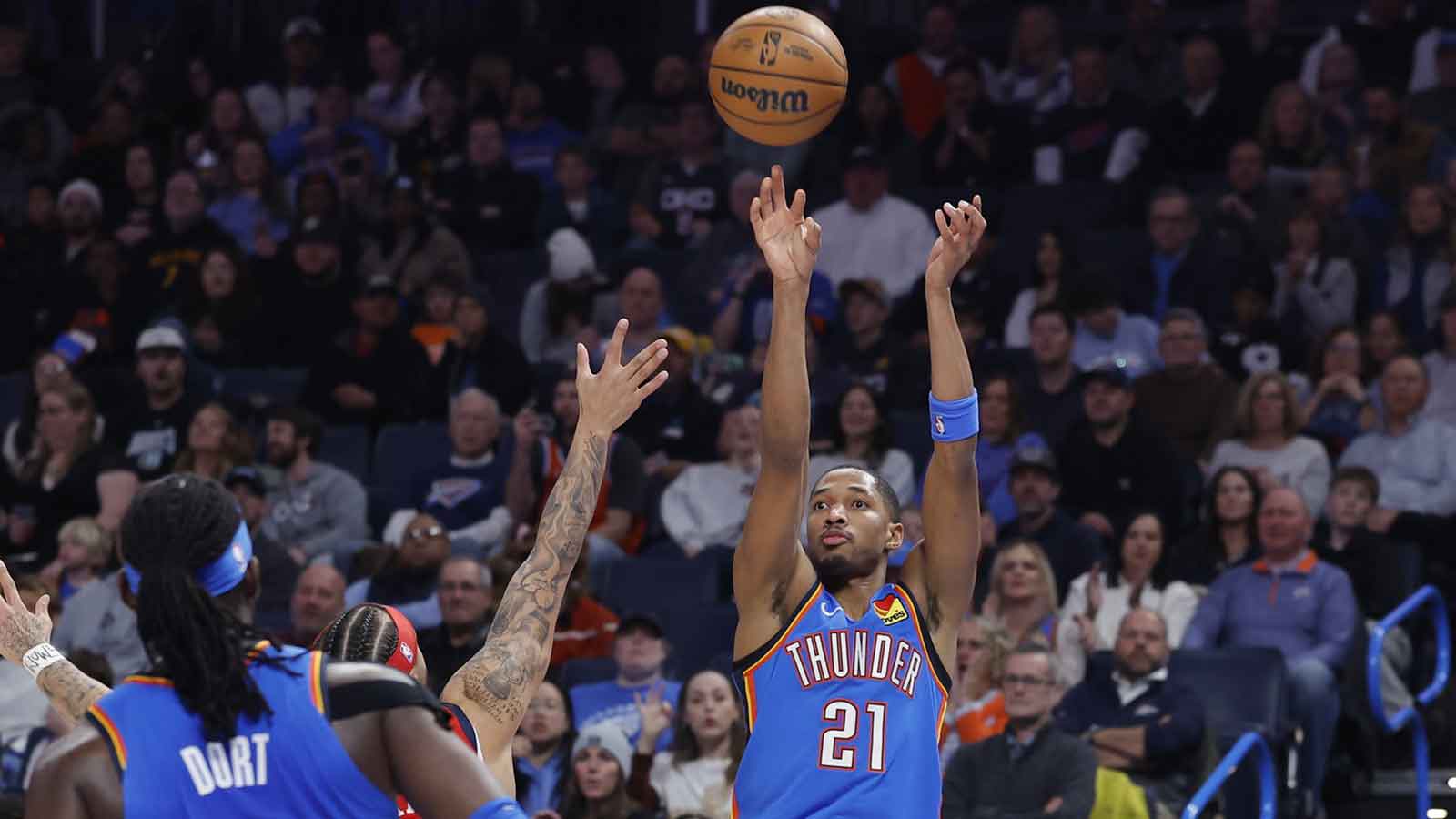 Thunder guard Aaron Wiggins (21) shoots a three point basket against the New Orleans Pelicans during the second half at Paycom Center