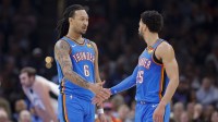 Thunder forward Jaylin Williams (6) and guard Ajay Mitchell (25) injury celebrate after a play against the San Antonio Spurs during the second quarter at Paycom Center