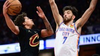 Cavs guard Craig Porter Jr. (9) drives to the basket against Oklahoma City Thunder center Chet Holmgren (7) during the second half at Rocket Arena