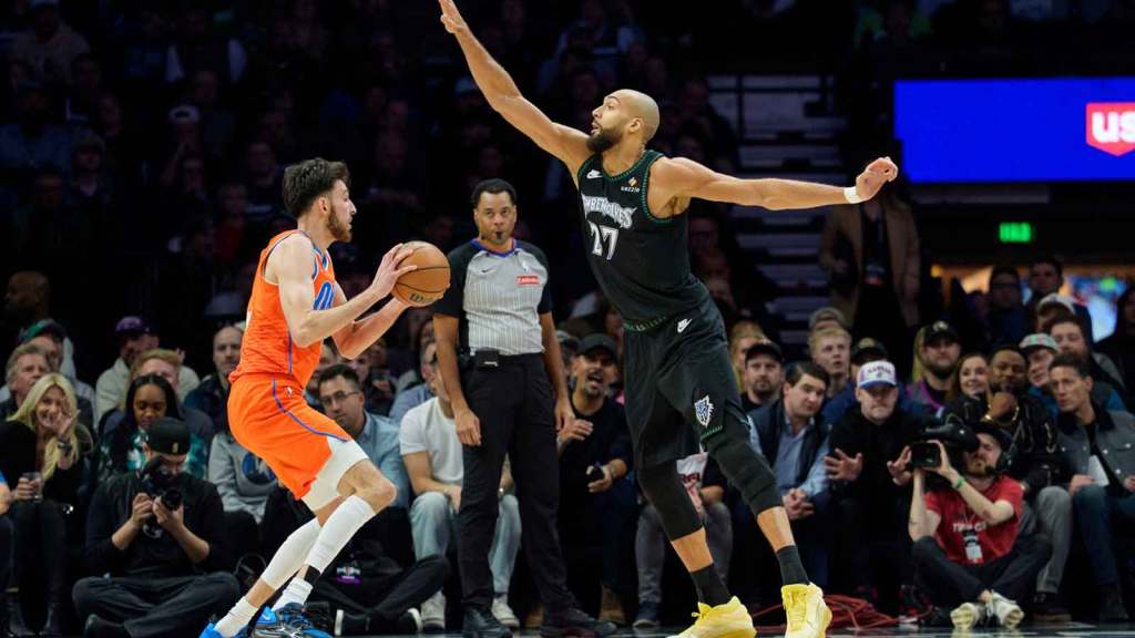 Thunder center Chet Holmgren (7) is challenged by Minnesota Timberwolves center Rudy Gobert (27) in the first quarter at Target Center