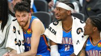 Thunder center Chet Holmgren (left) and guard Shai Gilgeous-Alexander (2) talk during the fourth quarter against the Golden State Warriors at Chase Center