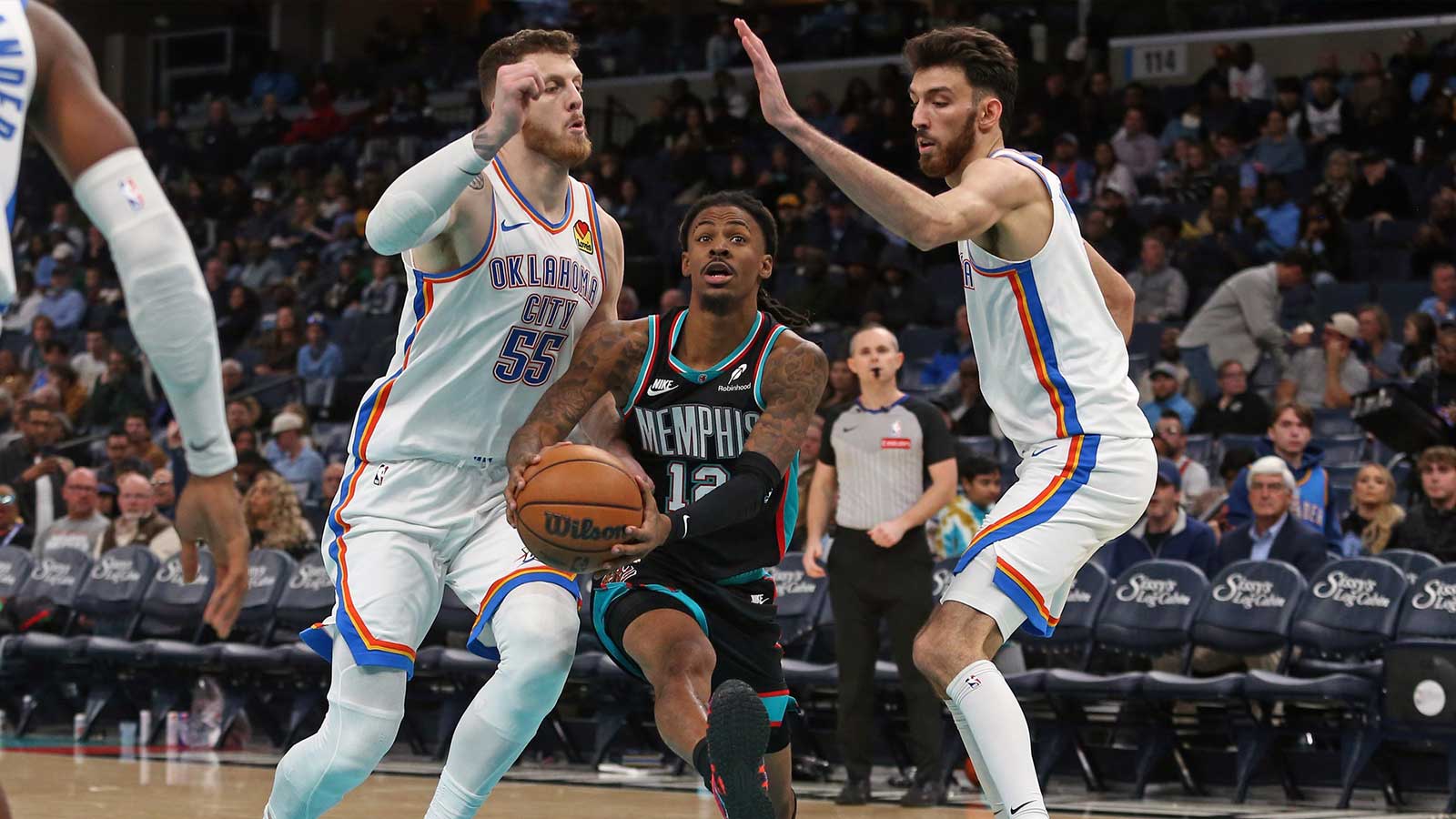 Thunder center Isaiah Hartenstein (55) and center Chet Holmgren (7) during the third quarter at FedExForum