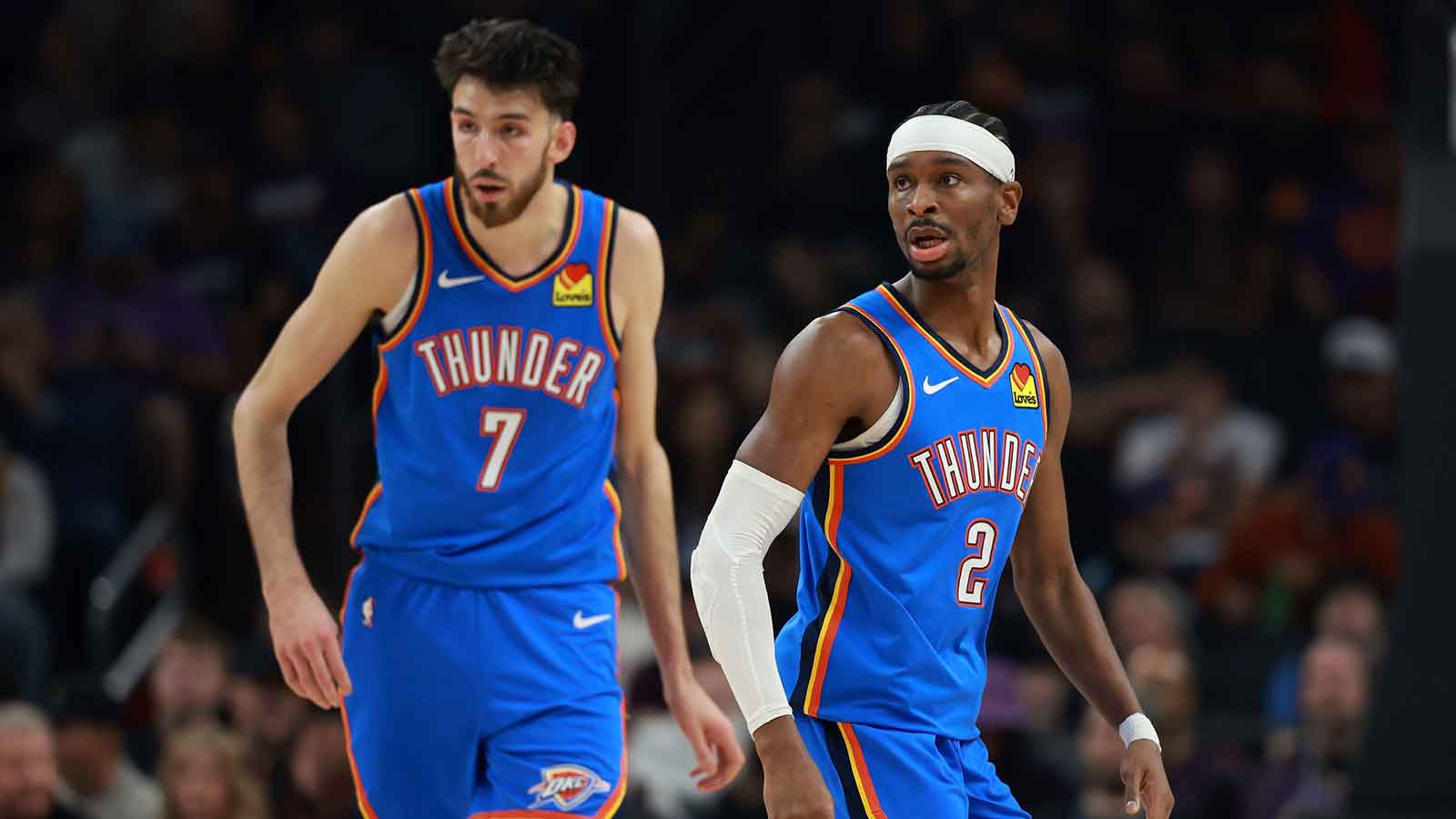 Thunder guard Shai Gilgeous-Alexander (2) and center Chet Holmgren (7) against the Phoenix Suns at Mortgage Matchup Center