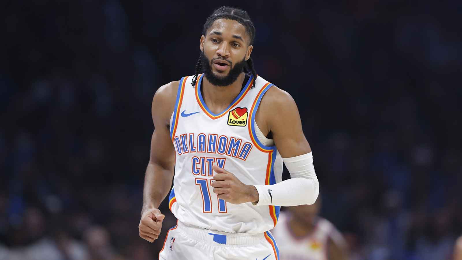 Thunder guard Isaiah Joe (11) runs down the court doing a play against the Charlotte Hornets during the second quarter at Paycom Center
