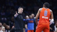 Thunder head coach Mark Daigneault talks to forward Jalen Williams (8) between plays against the Utah Jazz during the second half of an NBA Cup game at Paycom Center