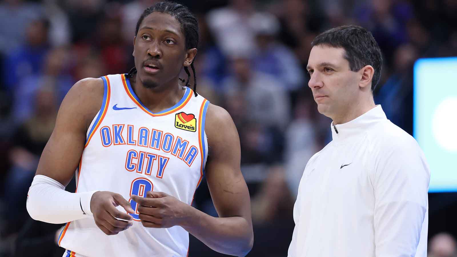 Thunder forward Jalen Williams (8) speaks with head coach Mark Daigneault during the second quarter at Delta Center