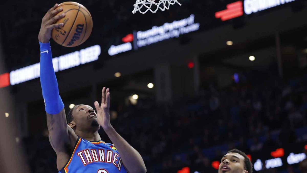 Thunder guard/forward Jalen Williams (8) shoots beside San Antonio Spurs forward/center Victor Wembanyama (1) during the second half at Paycom Center
