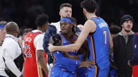 Thunder center/forward Chet Holmgren (7) pulls Oklahoma City Thunder guard Luguentz Dort (5) away from a scuffle with New Orleans Pelicans guard Jeremiah Fears (0) during the second half at Paycom Center with Pelicans' Jeremiah Fears