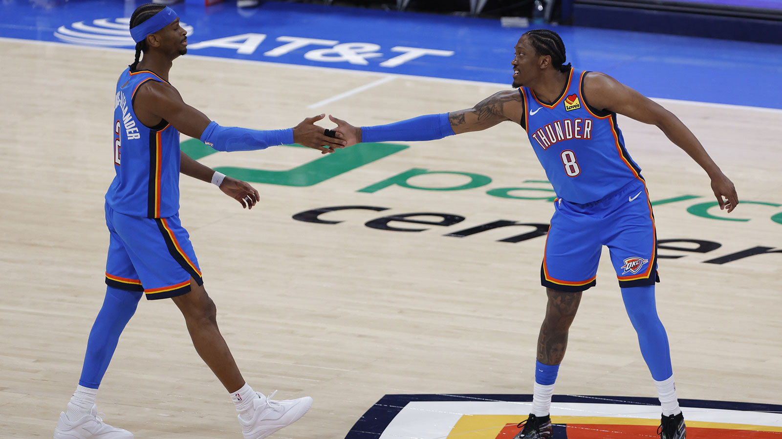 Thunder guard/forward Jalen Williams (8) celebrates with Oklahoma City Thunder guard Shai Gilgeous-Alexander (2) after he scored against the San Antonio Spurs during the second half at Paycom Center