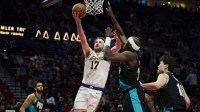Los Angeles Lakers forward Drew Timme (17) drives to the basket during the second half against Portland Trail Blazers center Duop Reath (26) at Moda Center.