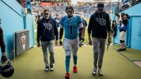 Tennessee Titans quarterback Cam Ward (1) heads to the locker room after the New Orleans Saints won 34-26 at Nissan Stadium in Nashville, Tenn., Sunday, Dec. 28, 2025.
