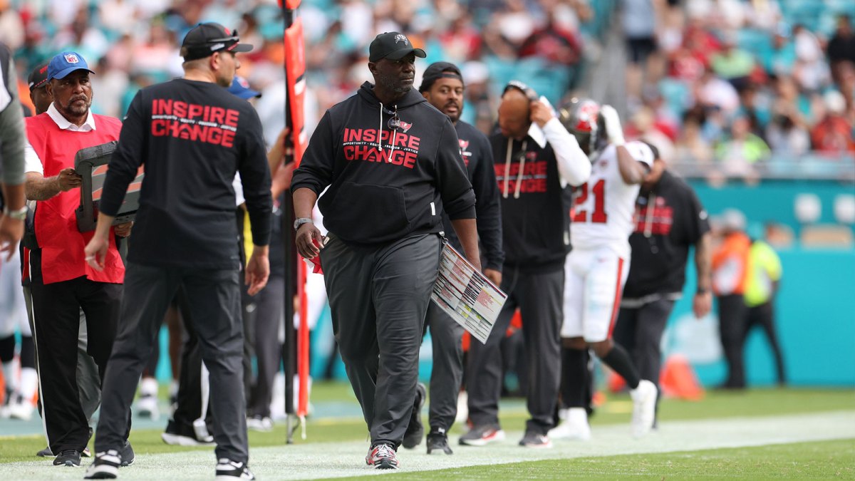 Tampa Bay Buccaneers head coach Todd Bowles walks on the sidelines during the second quarter against the Miami Dolphins at Hard Rock Stadium.
