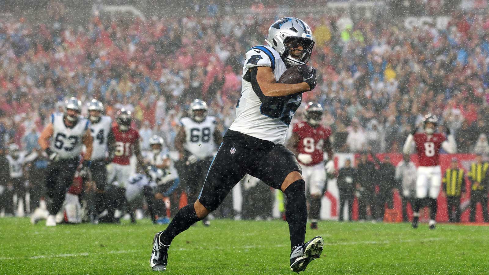 Carolina Panthers tight end Tommy Tremble (82) runs to score a touchdown against the Tampa Bay Buccaneers in the first half at Raymond James Stadium.