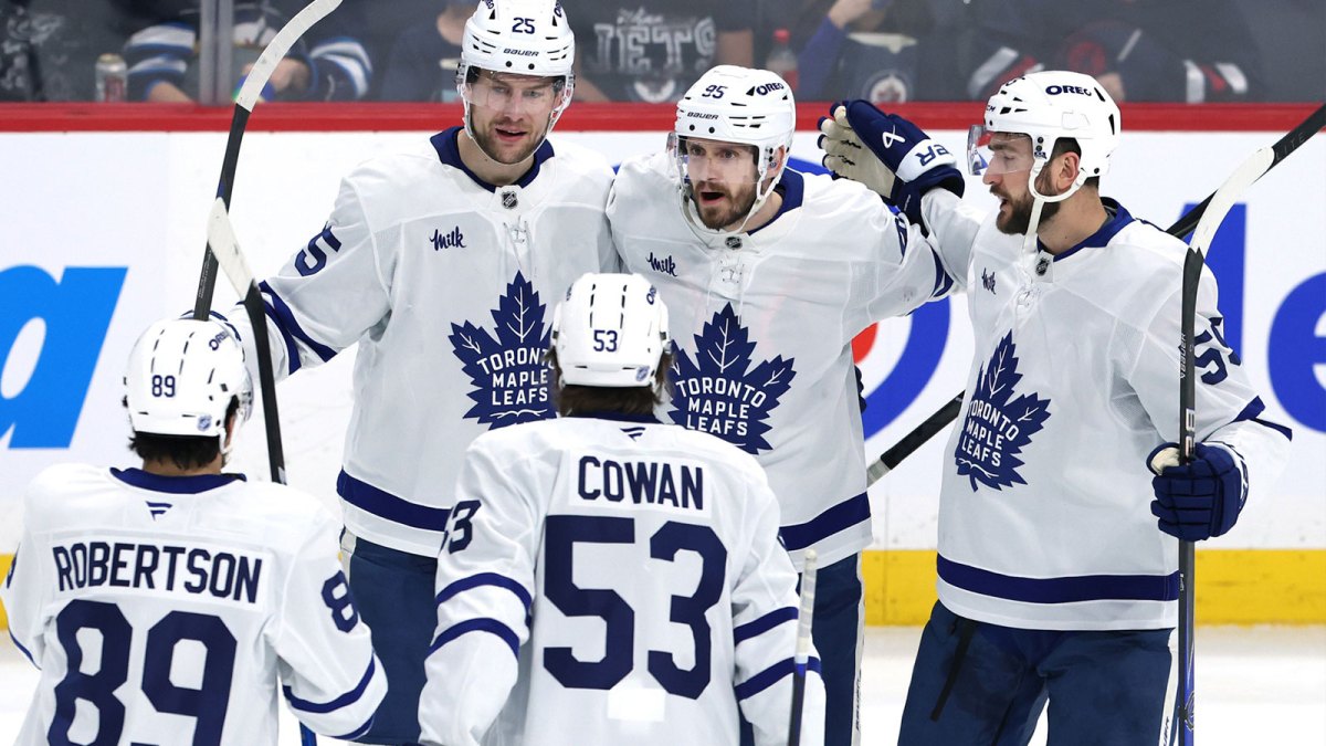 Toronto Maple Leafs defenseman Oliver Ekman-Larsson (95) celebrates a goal against the Winnipeg Jets in the third period at Canada Life Centre.