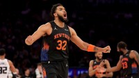 New York Knicks center Karl-Anthony Towns (32) reacts during the fourth quarter against the Sacramento Kings at Madison Square Garden.