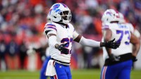 Buffalo Bills cornerback Tre'davious White (27) celebrates after an interception during the third quarter of an AFC Divisional Round playoff game against the Denver Broncos at Empower Field at Mile High.