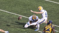 Pittsburgh Panthers place kicker Trey Butkowski (93) kicks a field goal during the second quarter against the West Virginia Mountaineers at Milan Puskar Stadium.