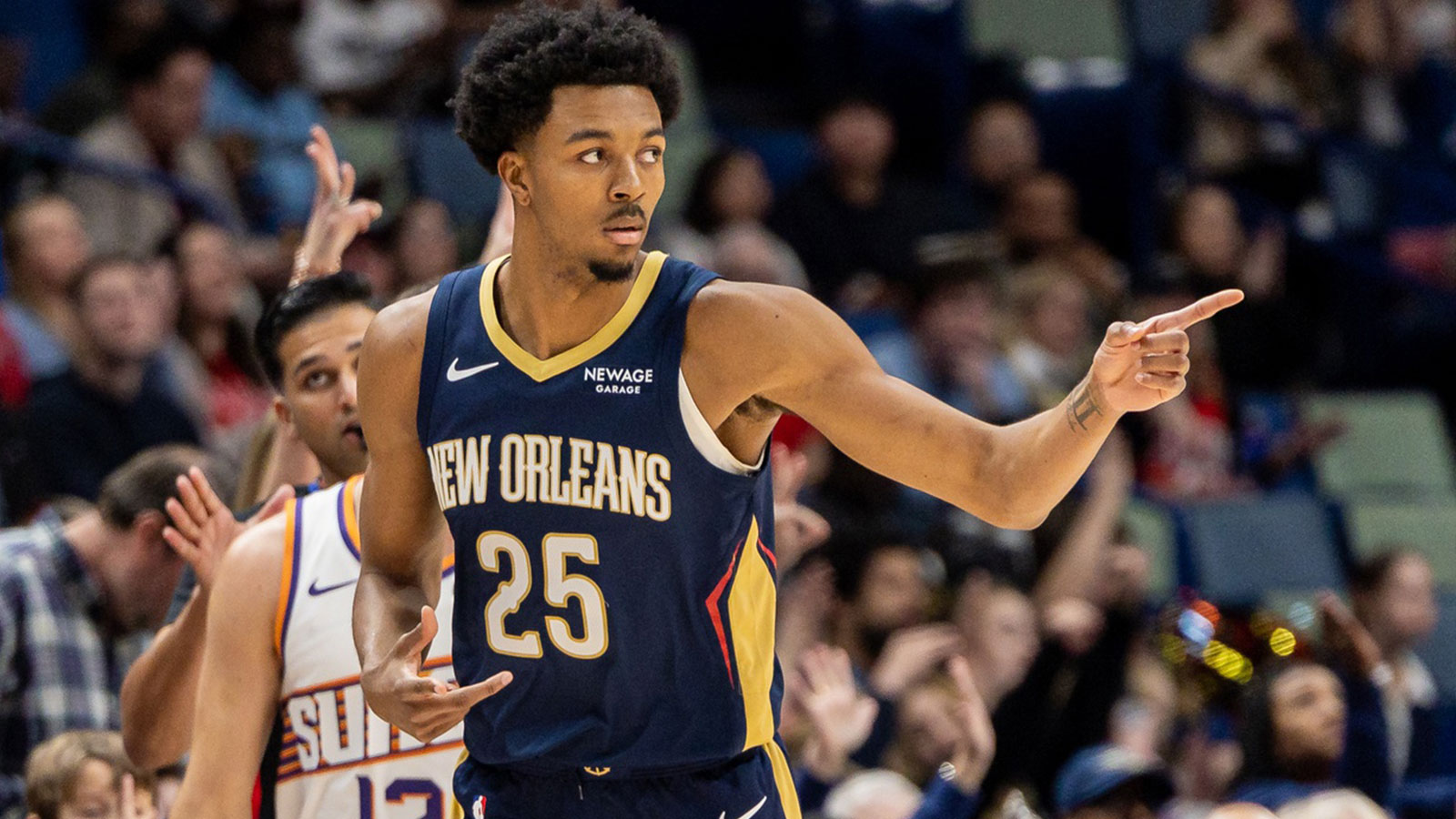 New Orleans Pelicans forward Trey Murphy III (25) reacts to making a three-point basket against the Phoenix Suns during the first half at Smoothie King Center.