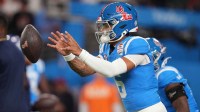 Ole Miss Rebels quarterback Trinidad Chambliss (6) warms up before their Vrbo Fiesta Bowl matchup against the Miami Hurricanes at State Farm Stadium in Glendale, on Jan. 8, 2026.