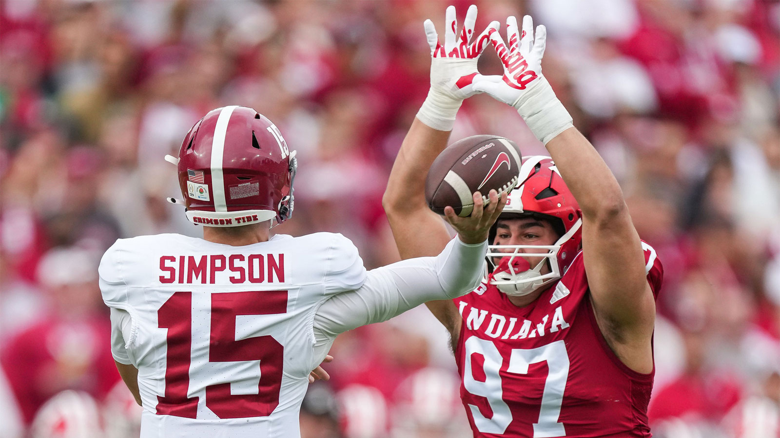 Alabama Crimson Tide quarterback Ty Simpson (15) throws the ball against Indiana Hoosiers defensive lineman Mario Landino (97) on Thursday, Jan. 1, 2026, during the 112th annual Rose Bowl game in Pasadena. Indiana Hoosiers defeated Alabama Crimson Tide, 38-3.