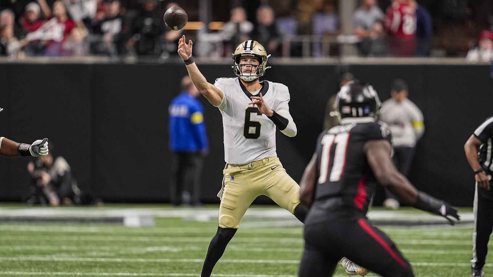 New Orleans Saints quarterback Tyler Shough (6) throws a pass during the game against the Atlanta Falcons during the second half at Mercedes-Benz Stadium.
