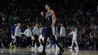 San Antonio Spurs forward Victor Wembanyama (1) celebrates in the second half against the New York Knicks at Frost Bank Center.